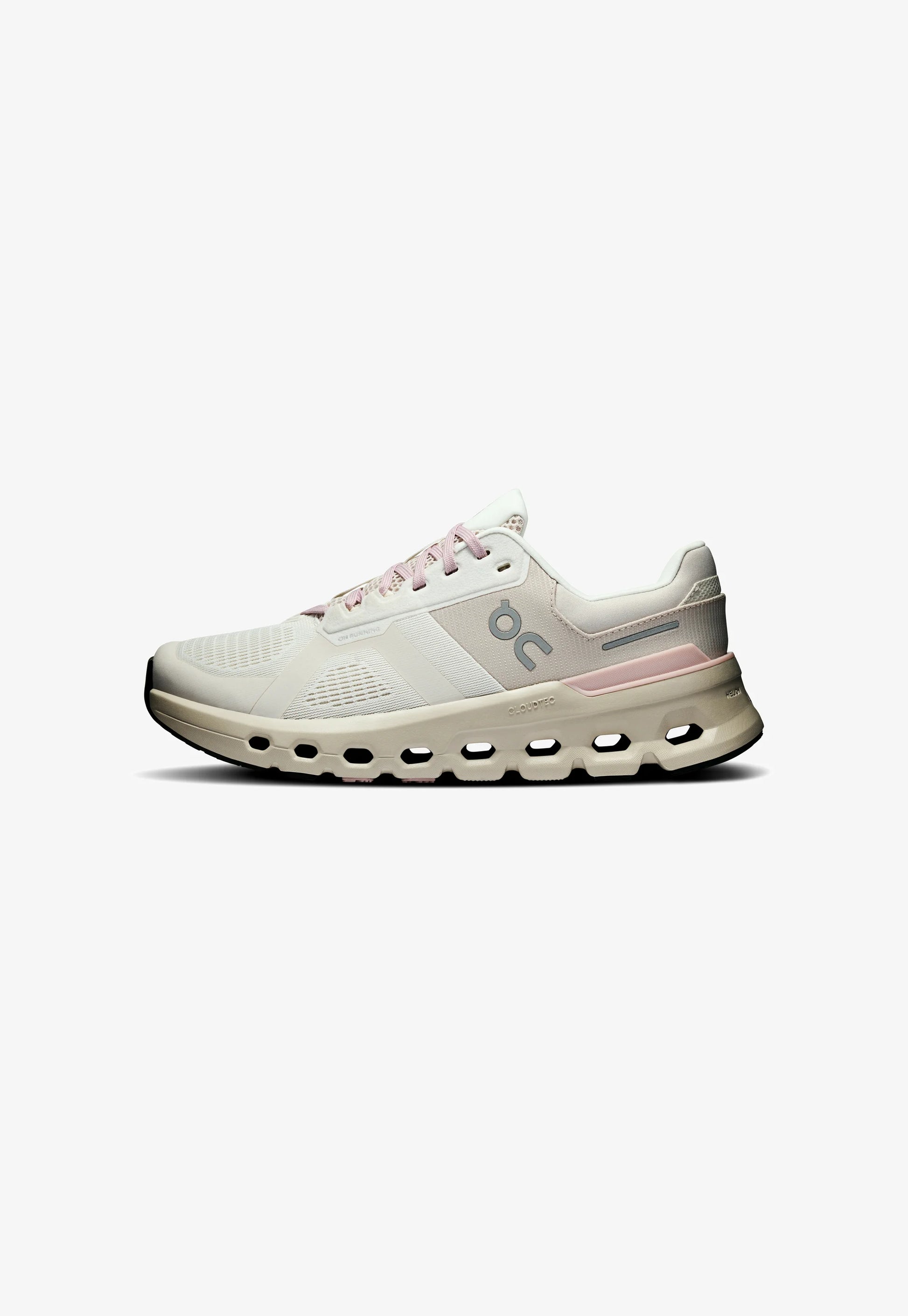 Scarpa da corsa beige chiaro e rosa con tomaia in rete, design unico della suola cava e logo laterale, mostrata dal profilo destro.