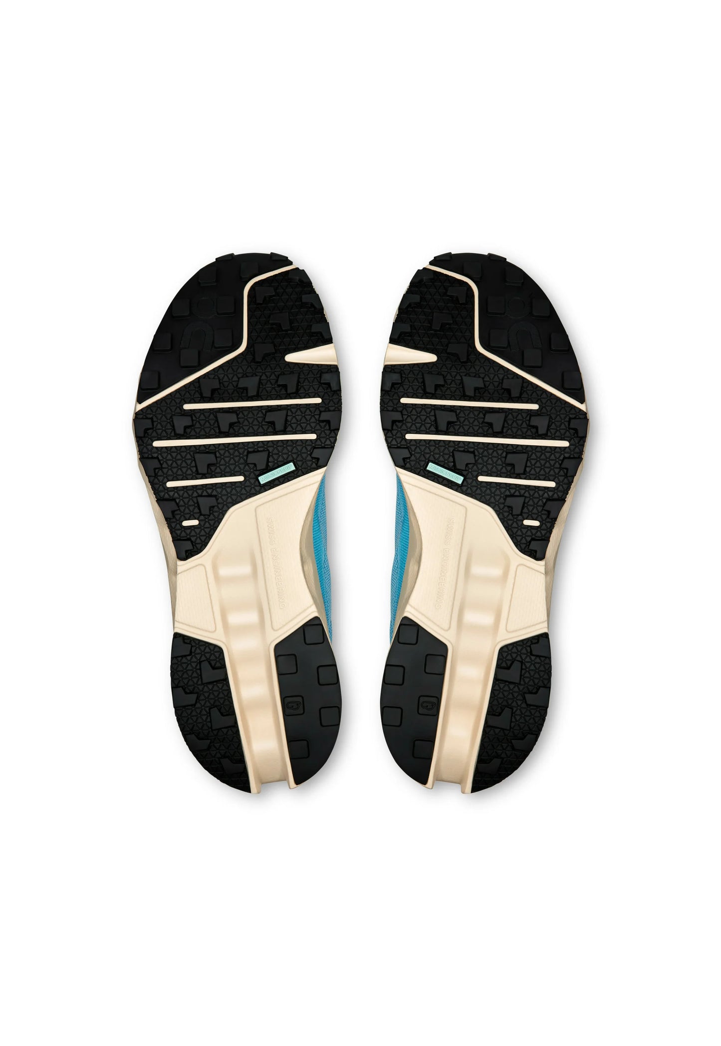 Scarpe da corsa con suole esterne in gomma nera, caratterizzate da un motivo di presa testurizzato. Intersuola color beige chiaro e tomaia in tessuto blu con accenti rinforzati.